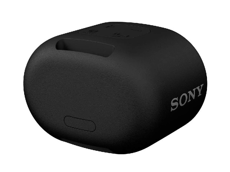 Un dispositivo negro y redondeado con la palabra SONY en el lateral. Tiene una pequeña ranura y algunos botones.
