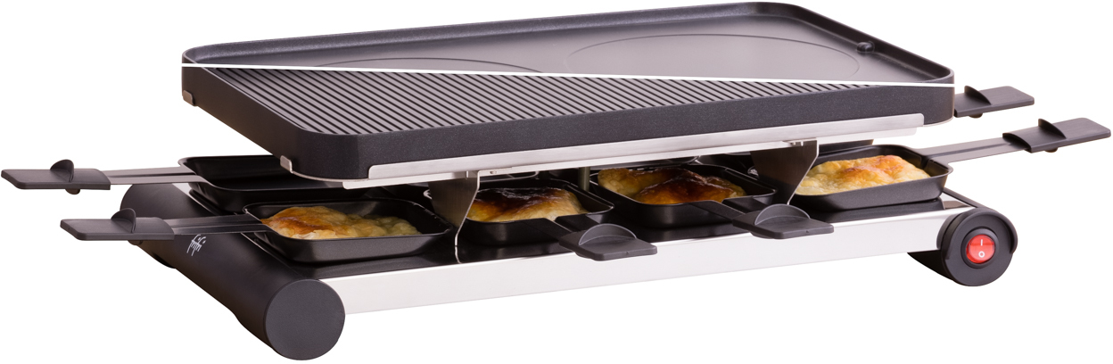 Raclette grill with cheese melting pans. The grill has a black top and silver base.