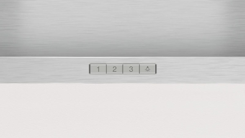 Primer plano de botones numerados 1, 2, 3 y un icono de luz en superficie blanca.