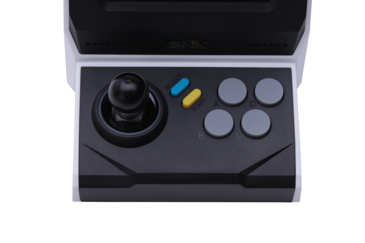 Un controlador de arcade SNK blanco y negro con joystick y botones.