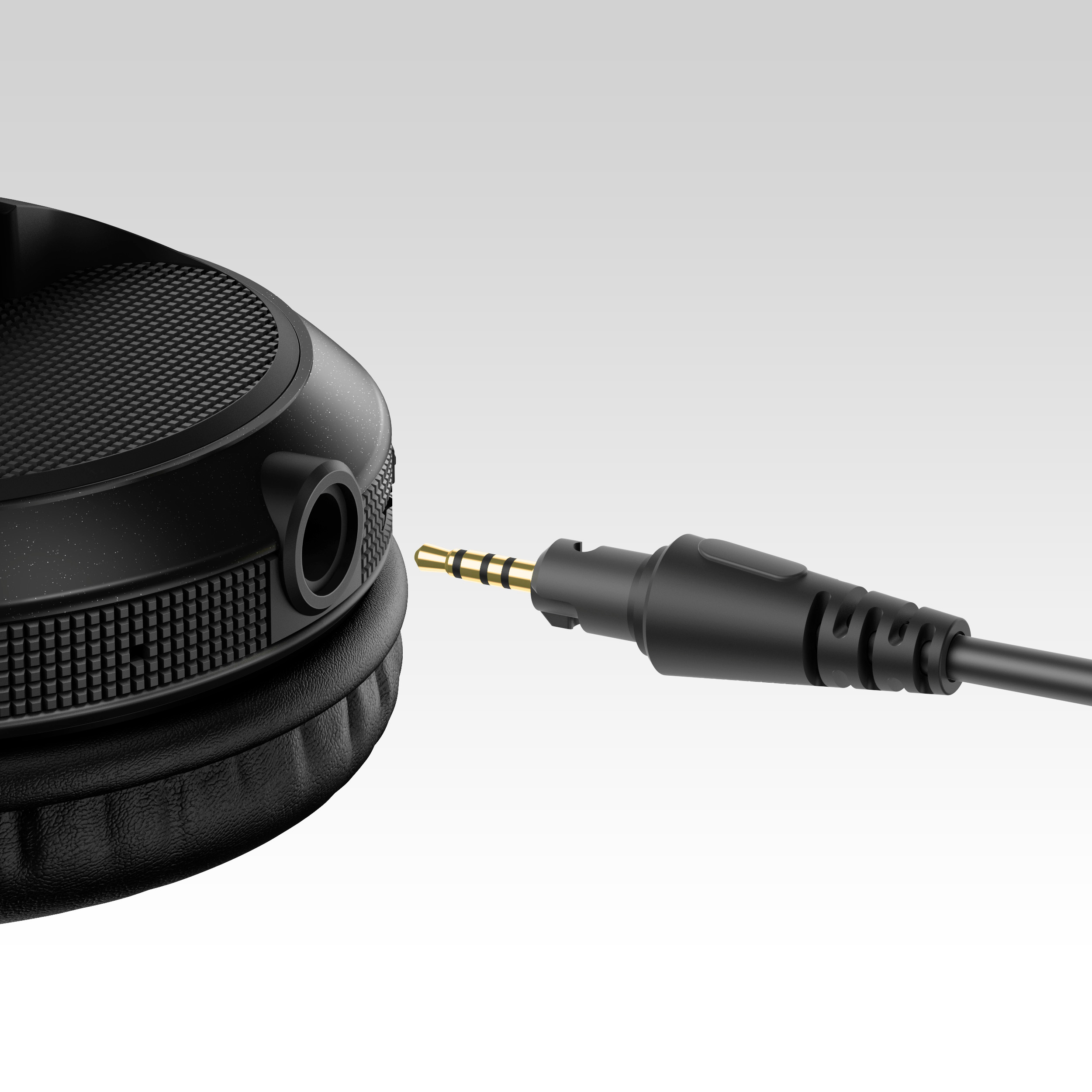 Schwarze Kopfhörer mit Kabel und goldfarbenem Klinkenstecker.