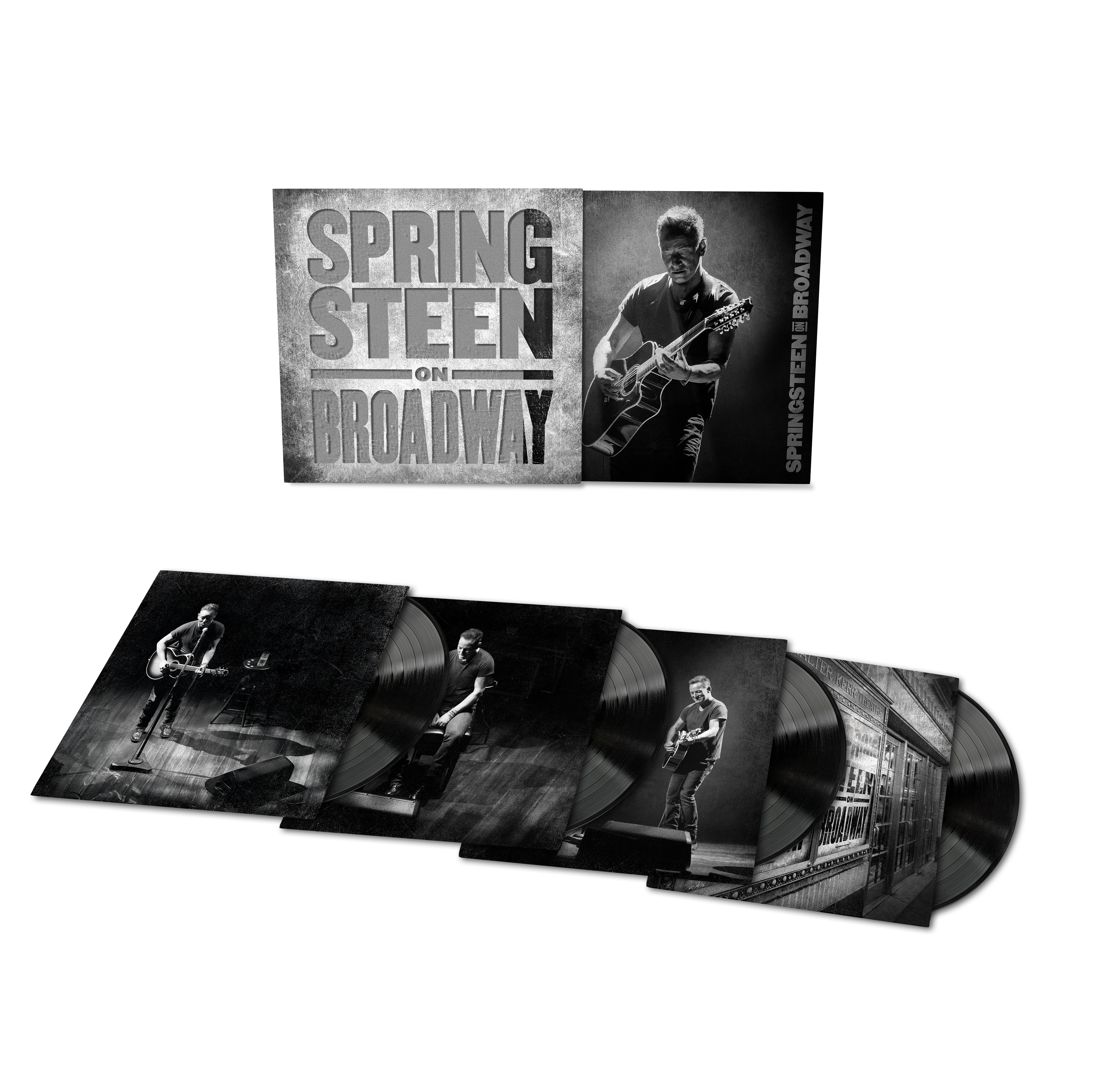 Albumcover und Schallplatten. Springsteen am Broadway. Schwarzweiß mit Bühnenbild.
