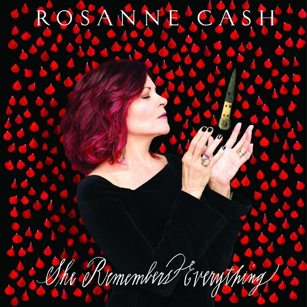 Albumhoes met Rosanne Cash, met een mes, rode tranen op een zwarte achtergrond. Titel: She Remembers Everything.