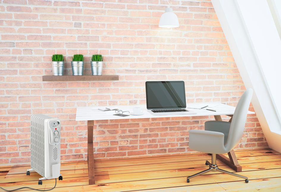 Office with a white desk, laptop, and a heater. Brick wall background with plants.