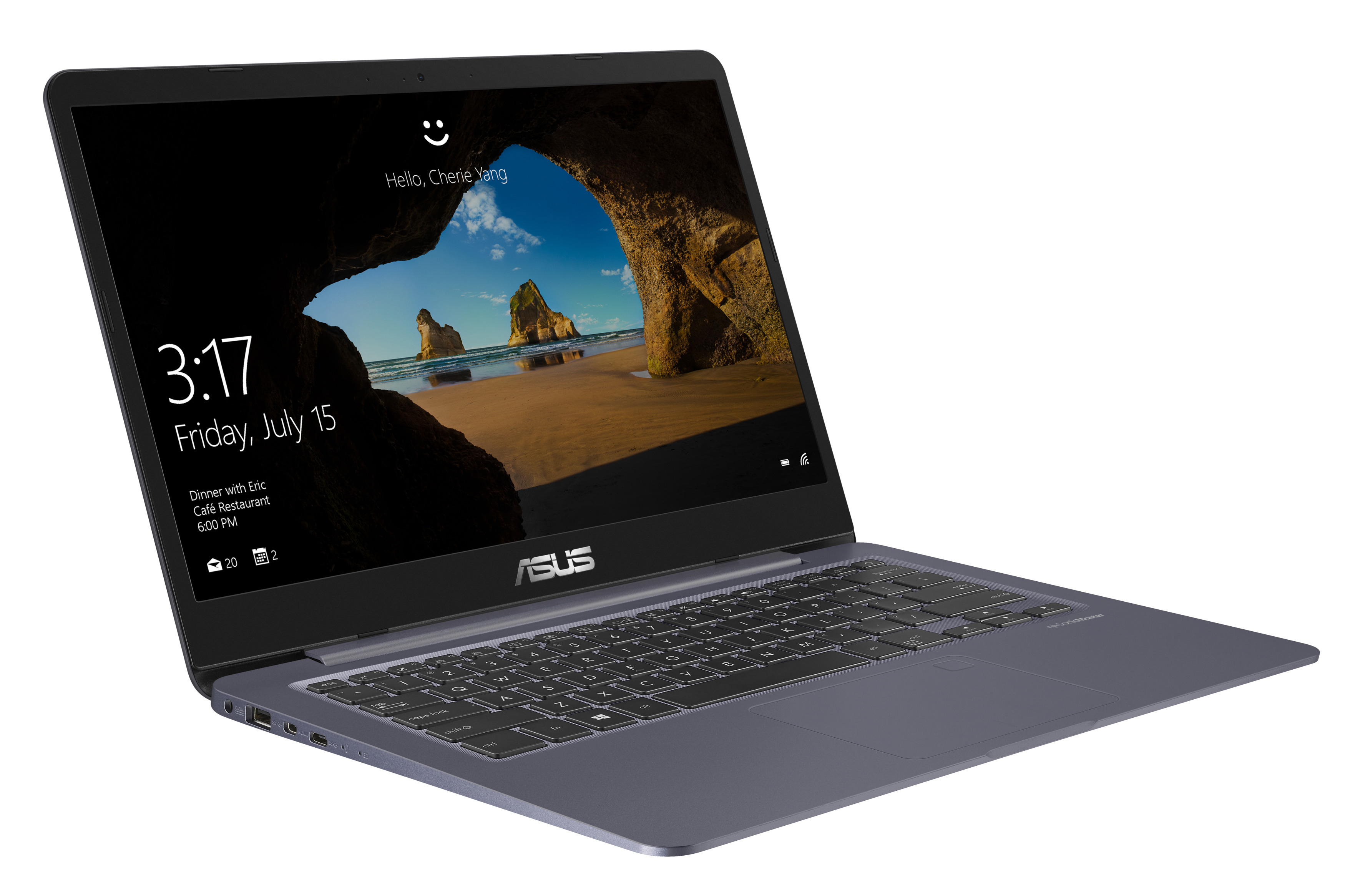 Laptop, der einen Sperrbildschirm mit Uhrzeit und Datum anzeigt. Die Marke ist ASUS. Grauer Laptop.