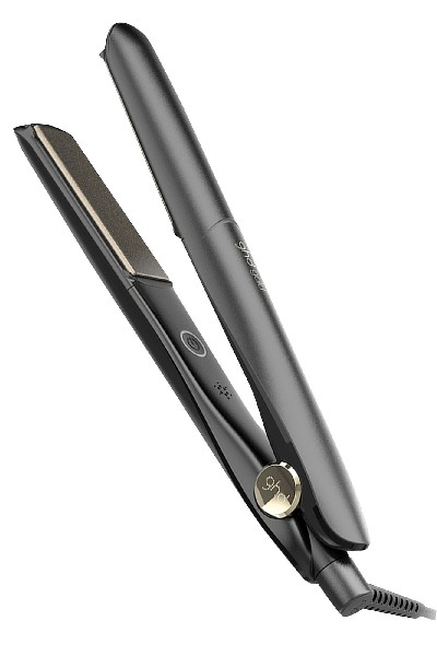 Una plancha de pelo ghd negra, abierta con una placa dorada. Diseño elegante.