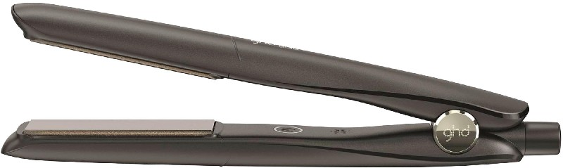 Plancha de pelo GHD gris oscuro, abierta y lista para usar. Placas plateadas.
