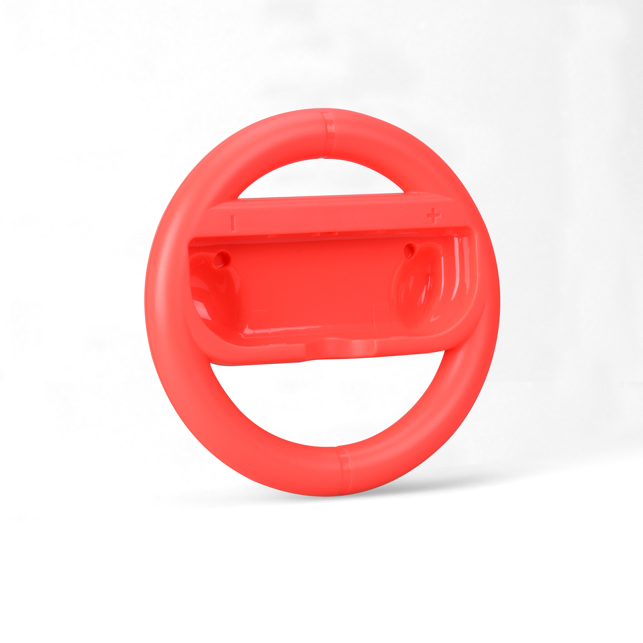 Ein rotes, lenkradförmiges Zubehör für einen Gamecontroller.