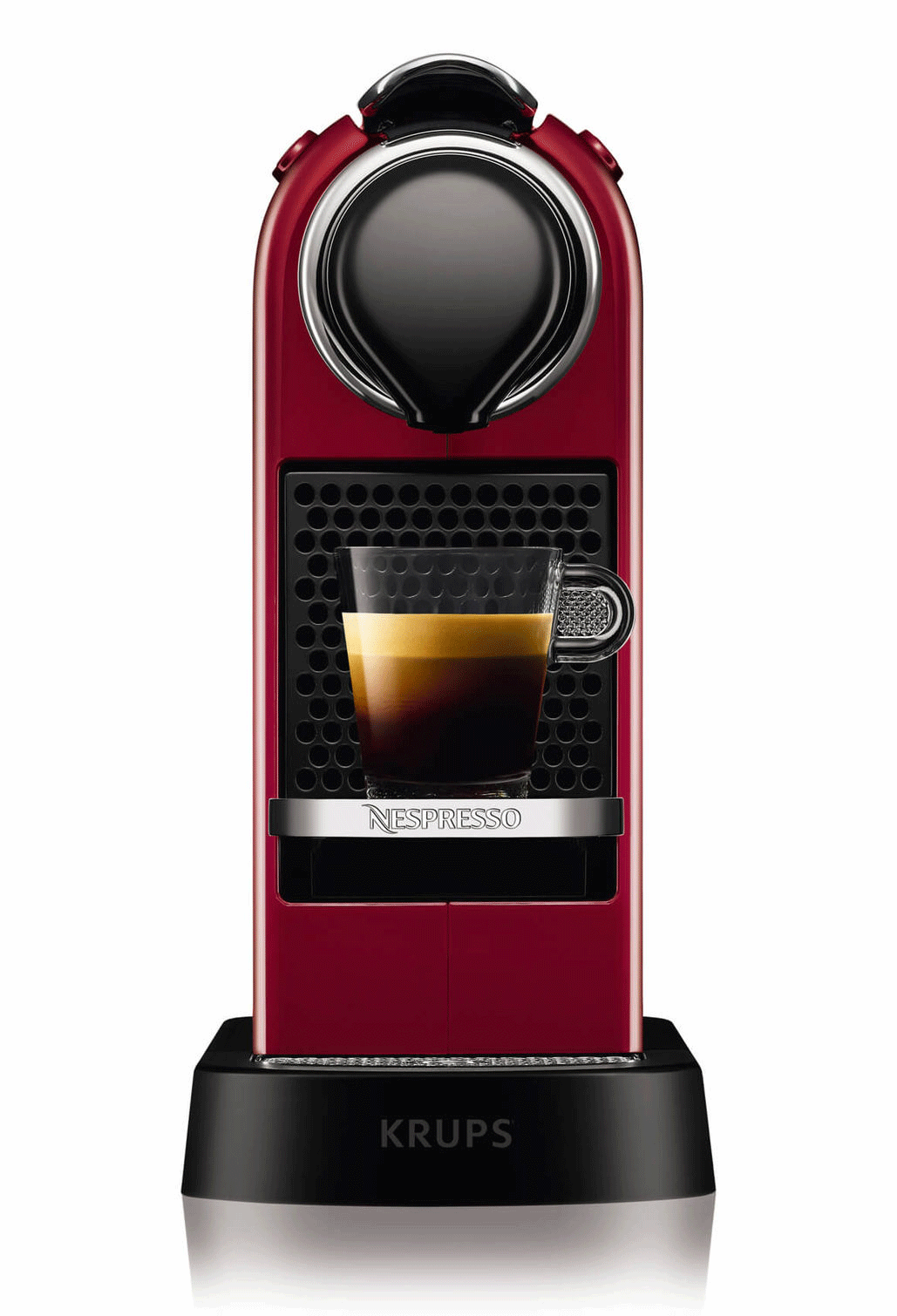 Machine Nespresso rouge avec une tasse à café en verre. Socle noir.