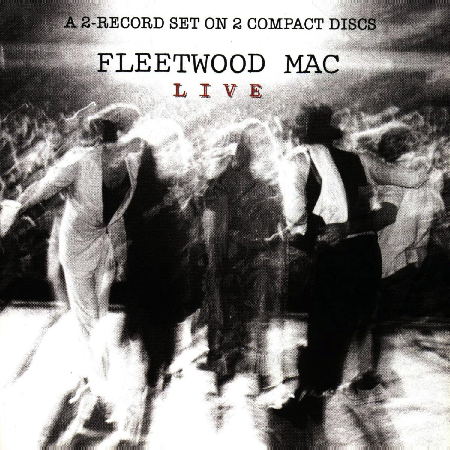 Fleetwood Mac Live Albumcover. Bandmitglieder auf einer Bühne, verschwommen, mit Publikum im Hintergrund.