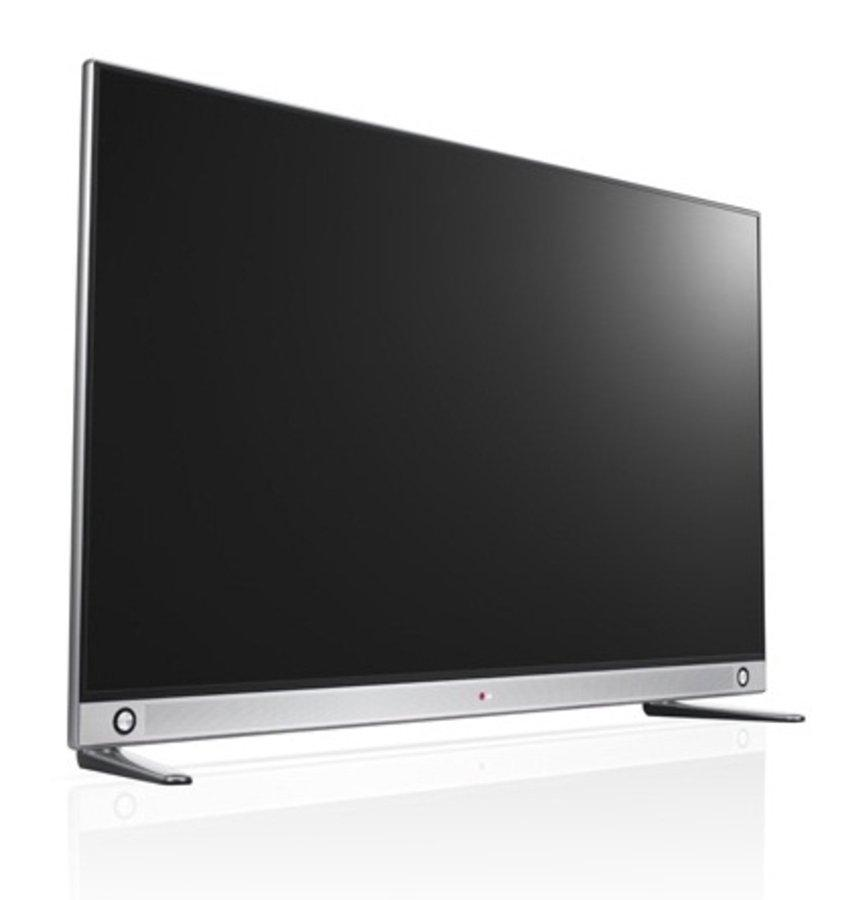 Un televisor plateado y negro. Base simple. Pantalla negra lisa. Fondo blanco.
