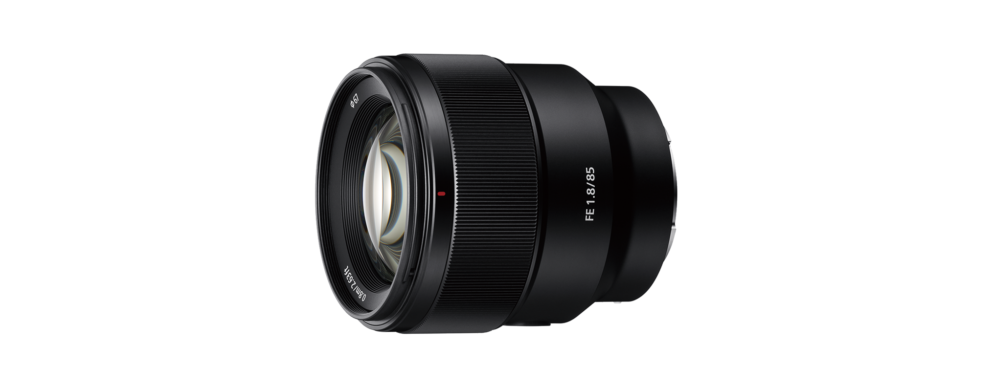 Schwarzes Kameraobjektiv auf schwarzem Hintergrund. Das Objektiv sagt: FE 1.8/85, 85mm, und hat einen roten Punkt.