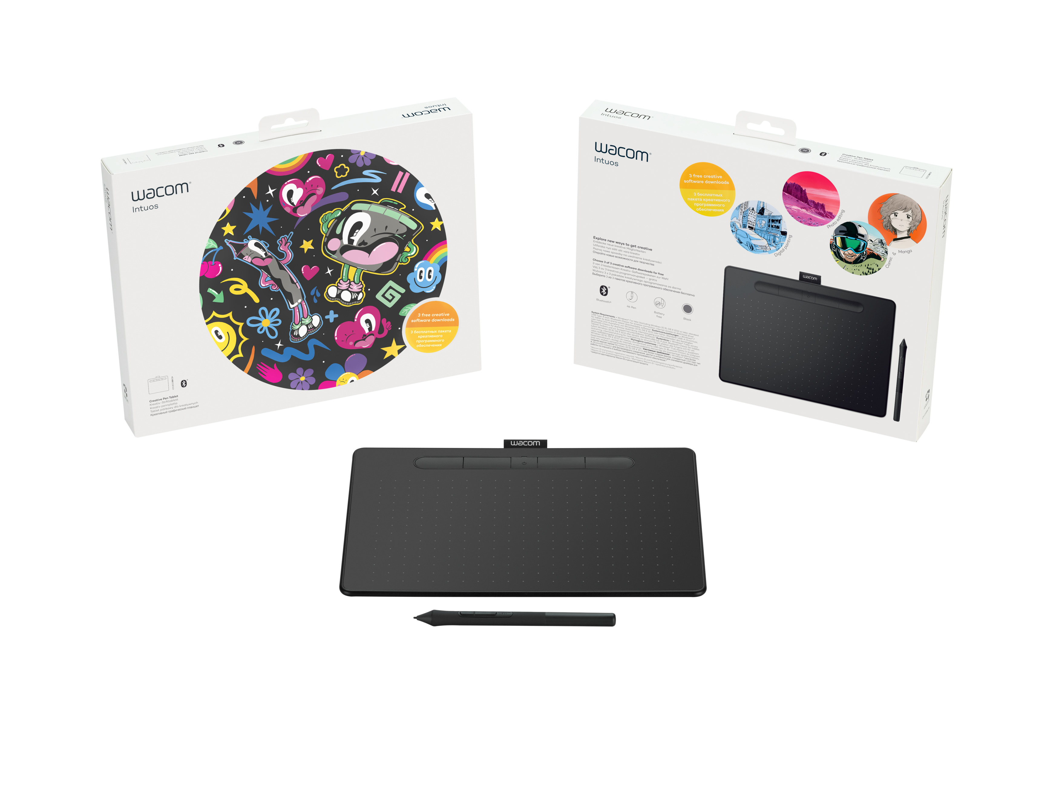 Ein Wacom Intuos Grafiktablett mit zwei Boxen und einem Stift.