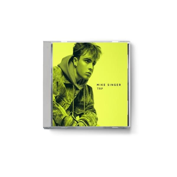 CD-Cover mit jungem Mann in grüner Jacke. Text: 'Mike Singer', 'Trip'.