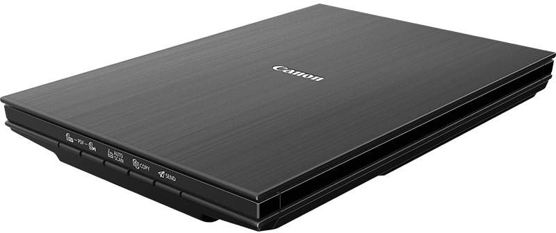 Un scanner Canon noir avec un design plat et rectangulaire. Les boutons sont à l'avant.