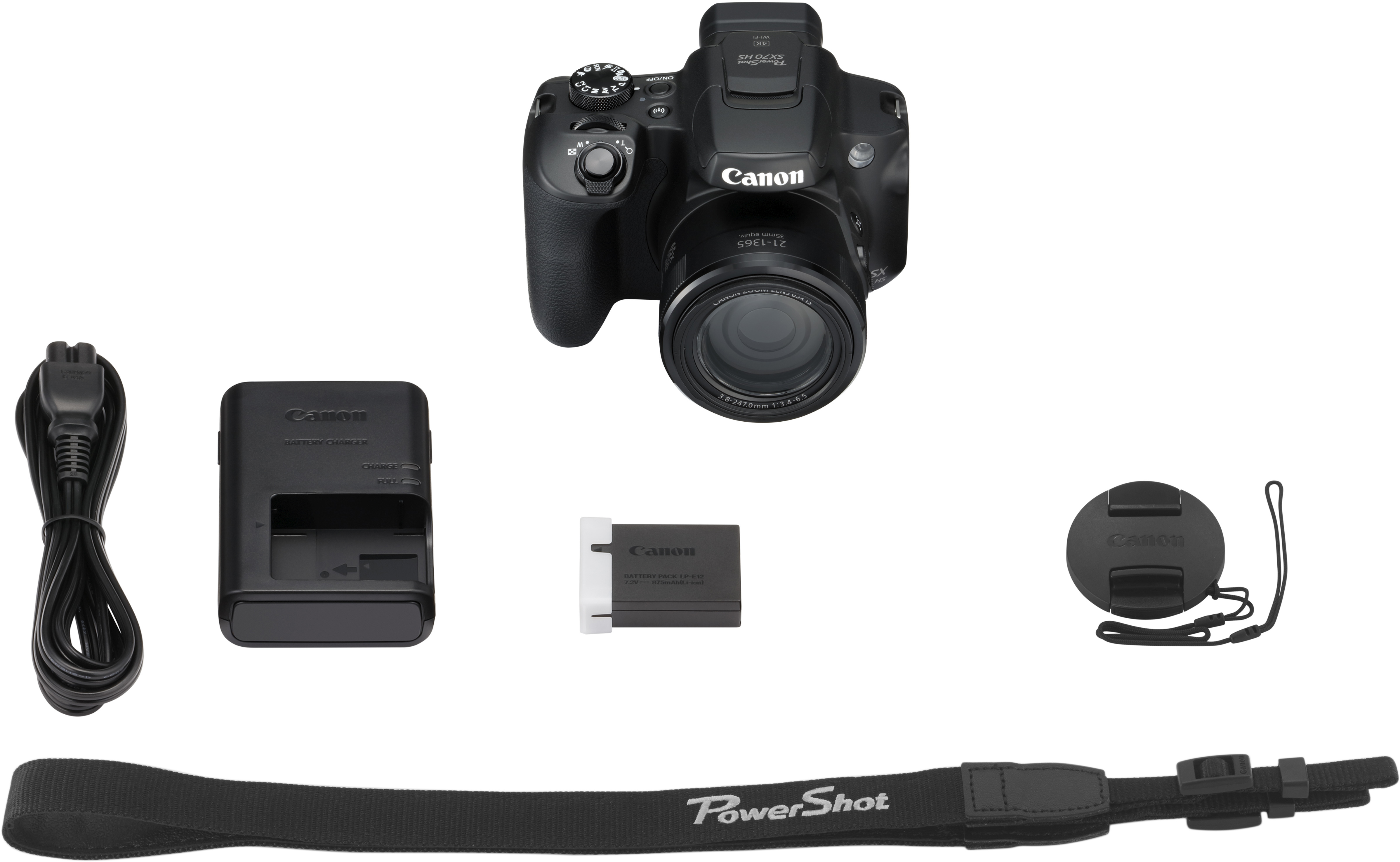 Black Canon camera, accessories: charger, battery, strap, and power cord.