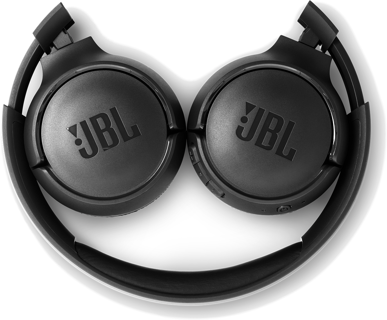 Casque JBL noir, plié en deux, formant un visage souriant.