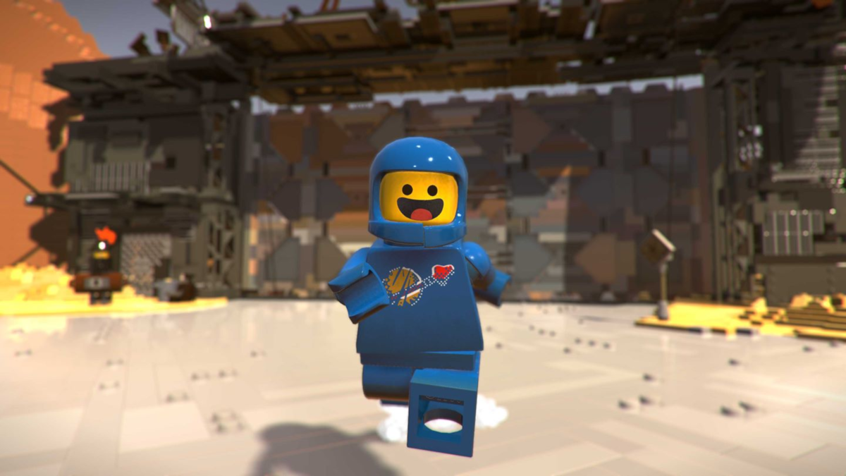 Un astronauta Lego in tuta spaziale blu. Una struttura futuristica sullo sfondo.