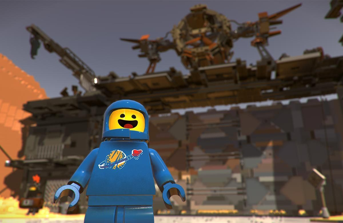 Astronauta Lego di fronte a un'astronave Lego e una struttura marrone.