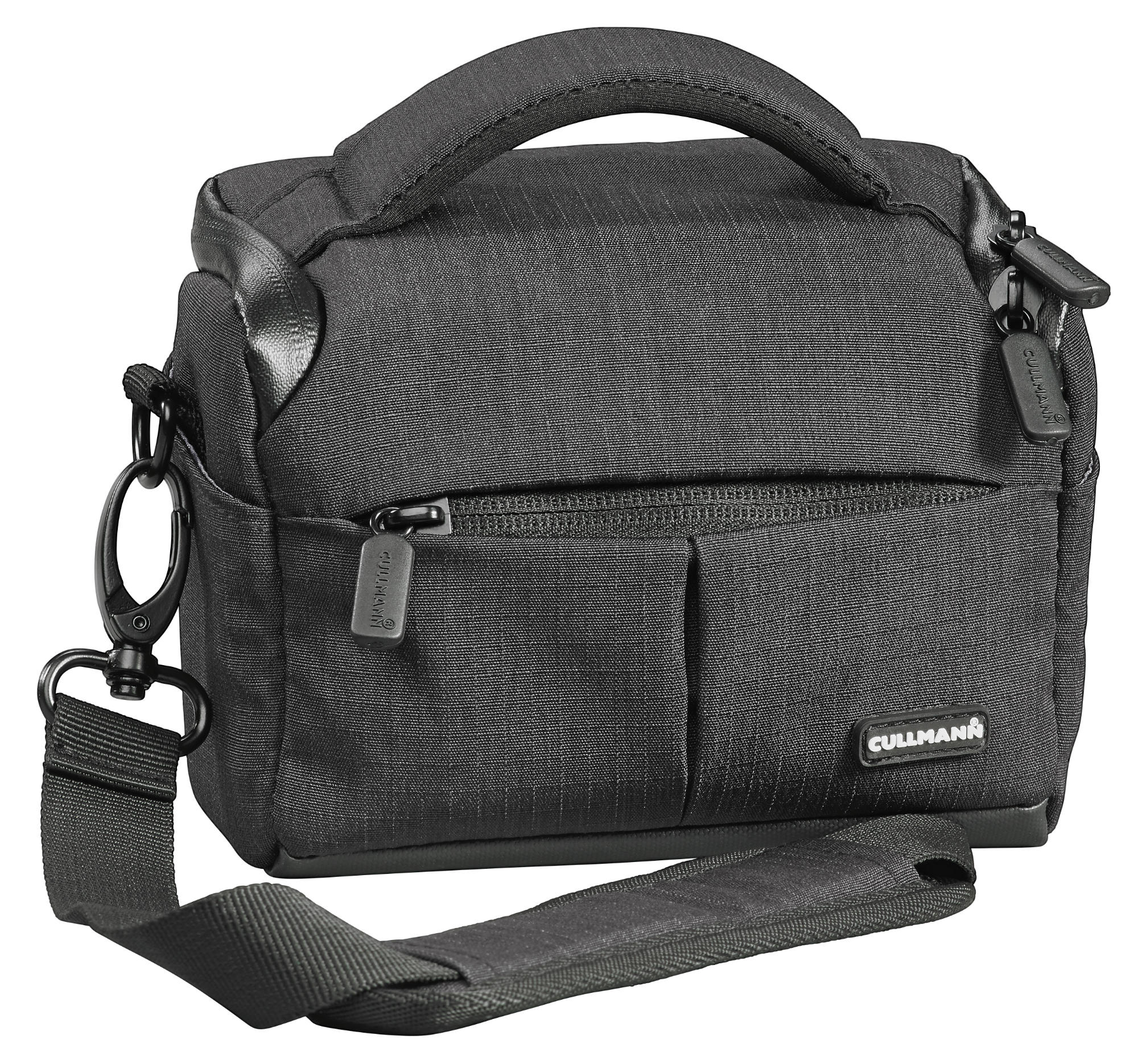 Black camera bag with a handle, a shoulder strap, and two zippers.
