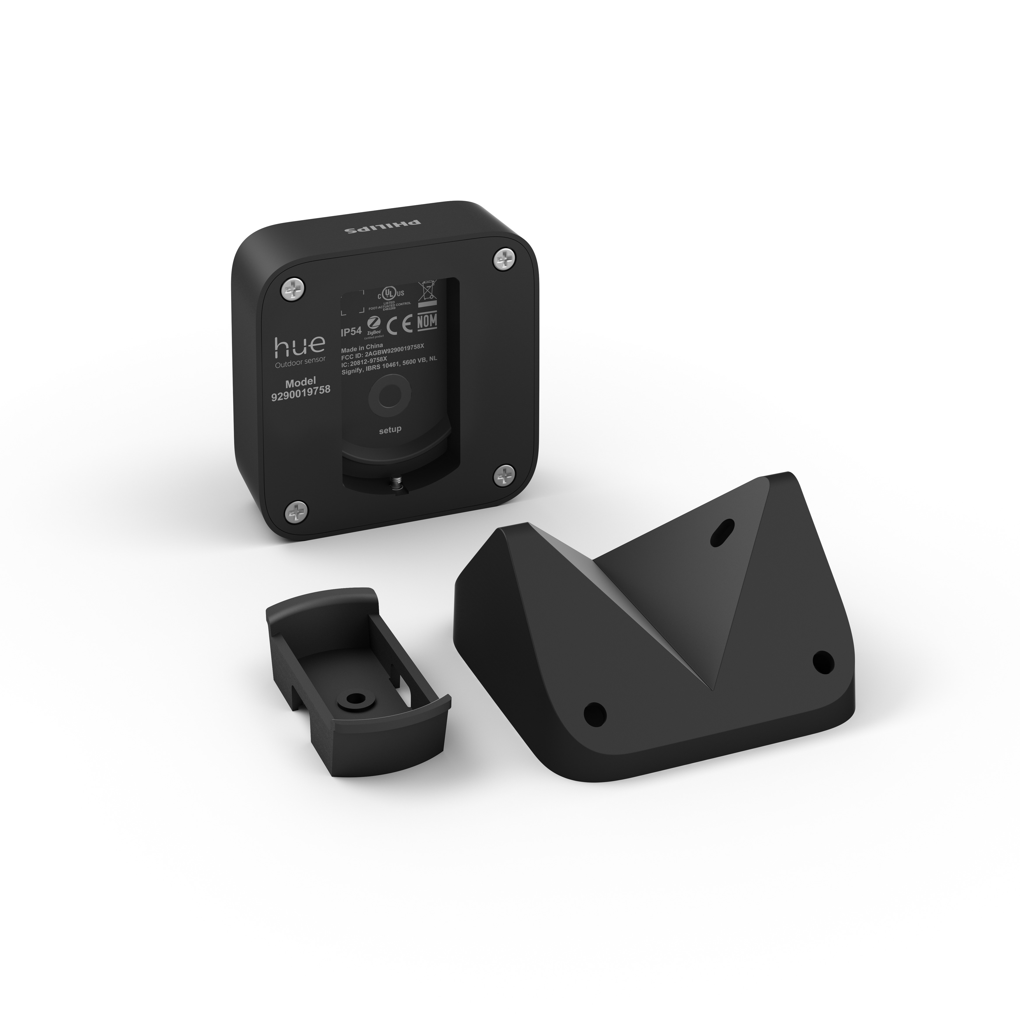 Schwarze Philips Hue-Lichtbasis mit Montagezubehör auf weißer Oberfläche.