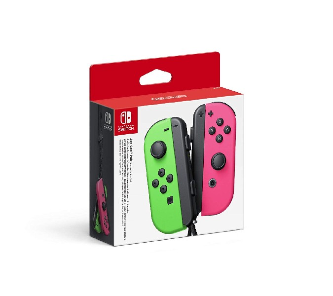 Un juego en caja de mandos Joy-Con de Nintendo Switch, uno verde y uno rosa, sobre fondo blanco, con embalaje rojo.