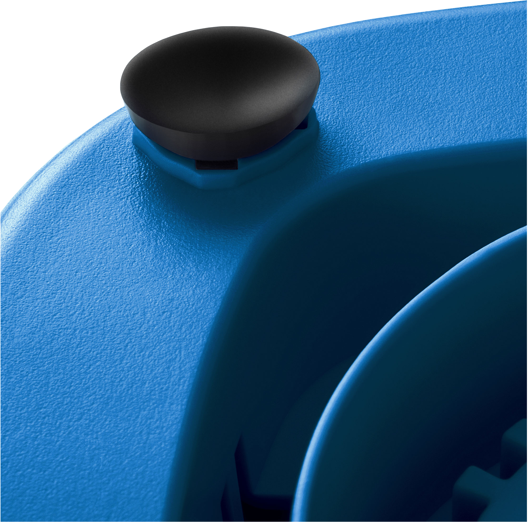 Közelkép egy kék műanyag felületről, fekete gombbal a tetején, textúrát és részleteket mutatva.