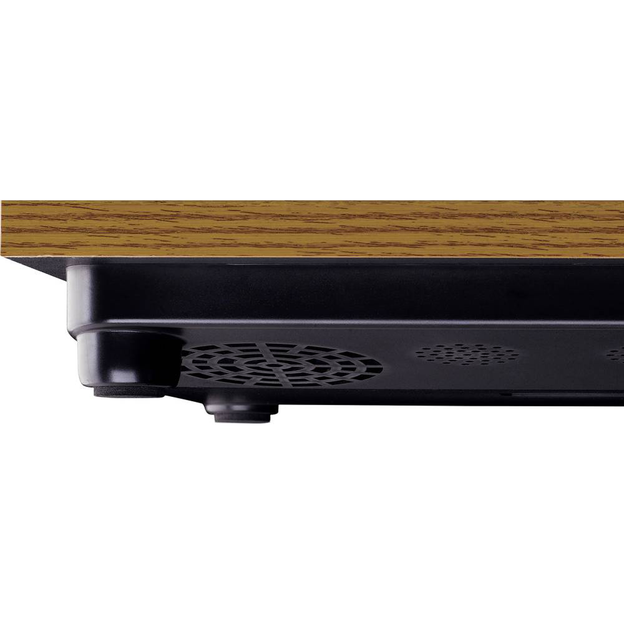 Underside of a wooden table with a black frame and ventilation slots.