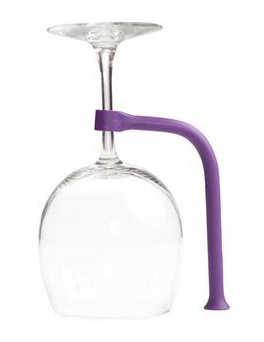 A wine glass with a purple holder attached to it, supporting the glass.