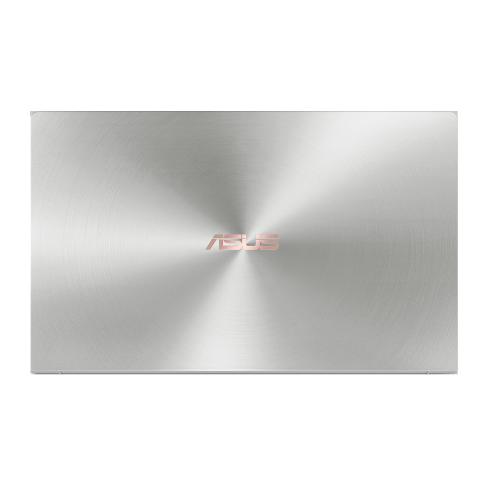Die silberne Oberfläche eines geschlossenen Laptops zeigt ein kreisförmiges Muster und das roségoldene Asus-Logo in der Mitte.