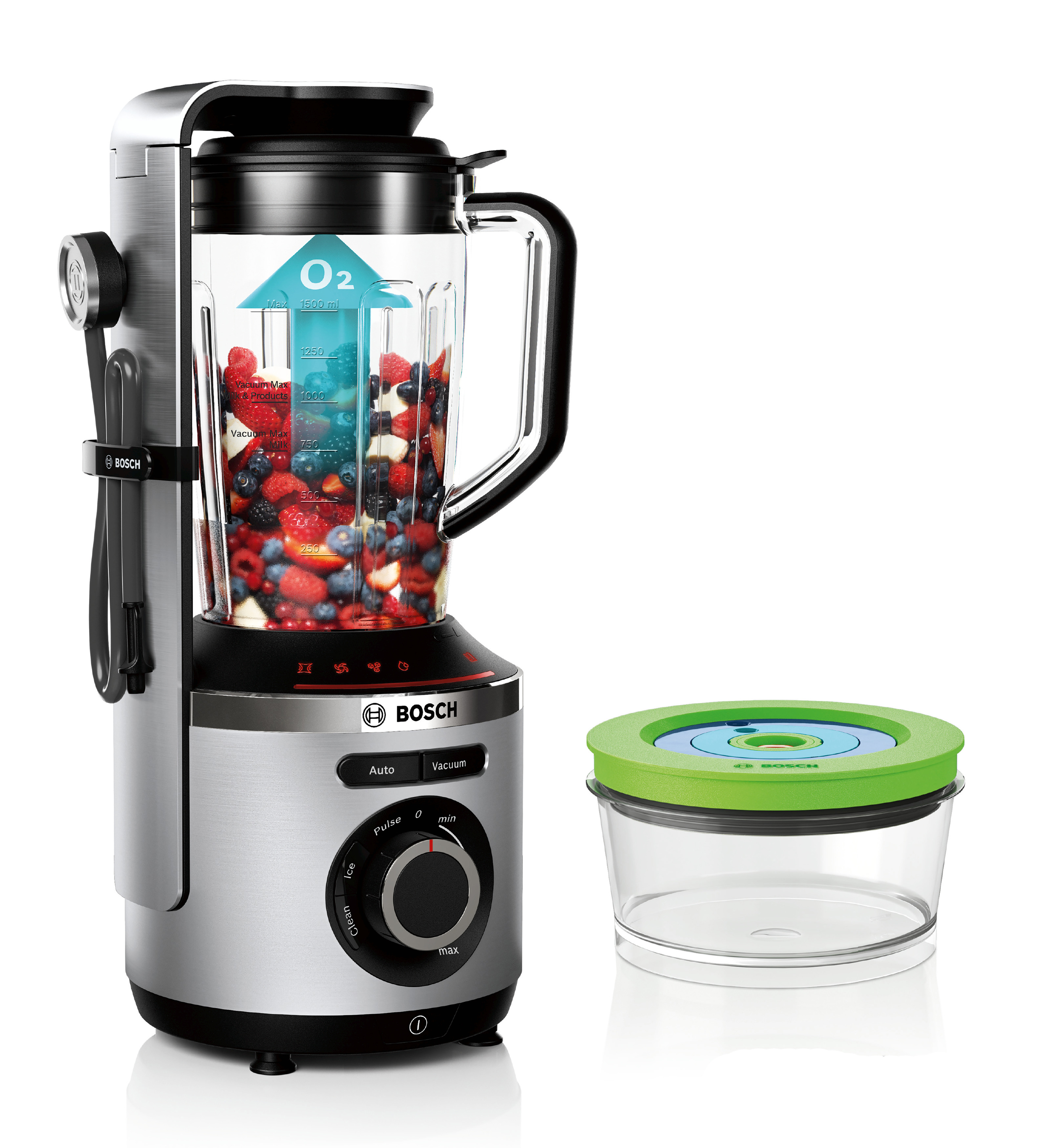 Bosch-Mixer mit bunten Früchten, separater Behälter mit grünem Deckel daneben.
