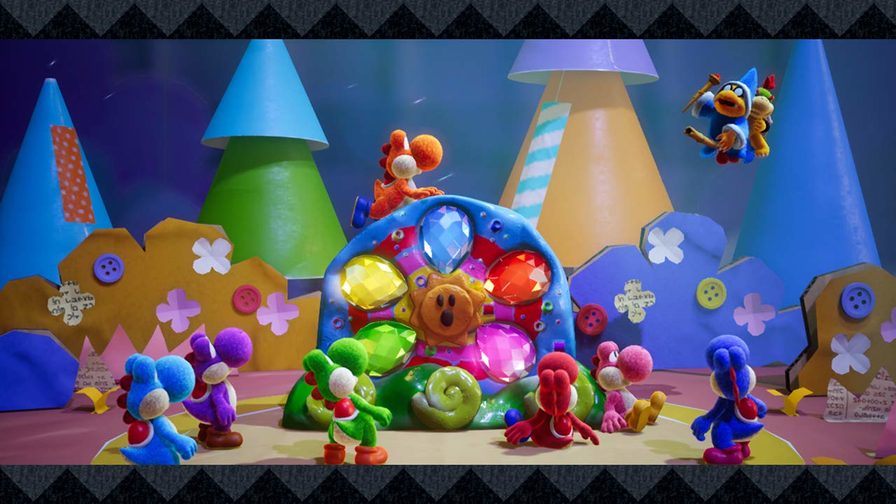 Personaggi Yoshi in una scena colorata con gemme, montagne e forme ritagliate. Sfondo.