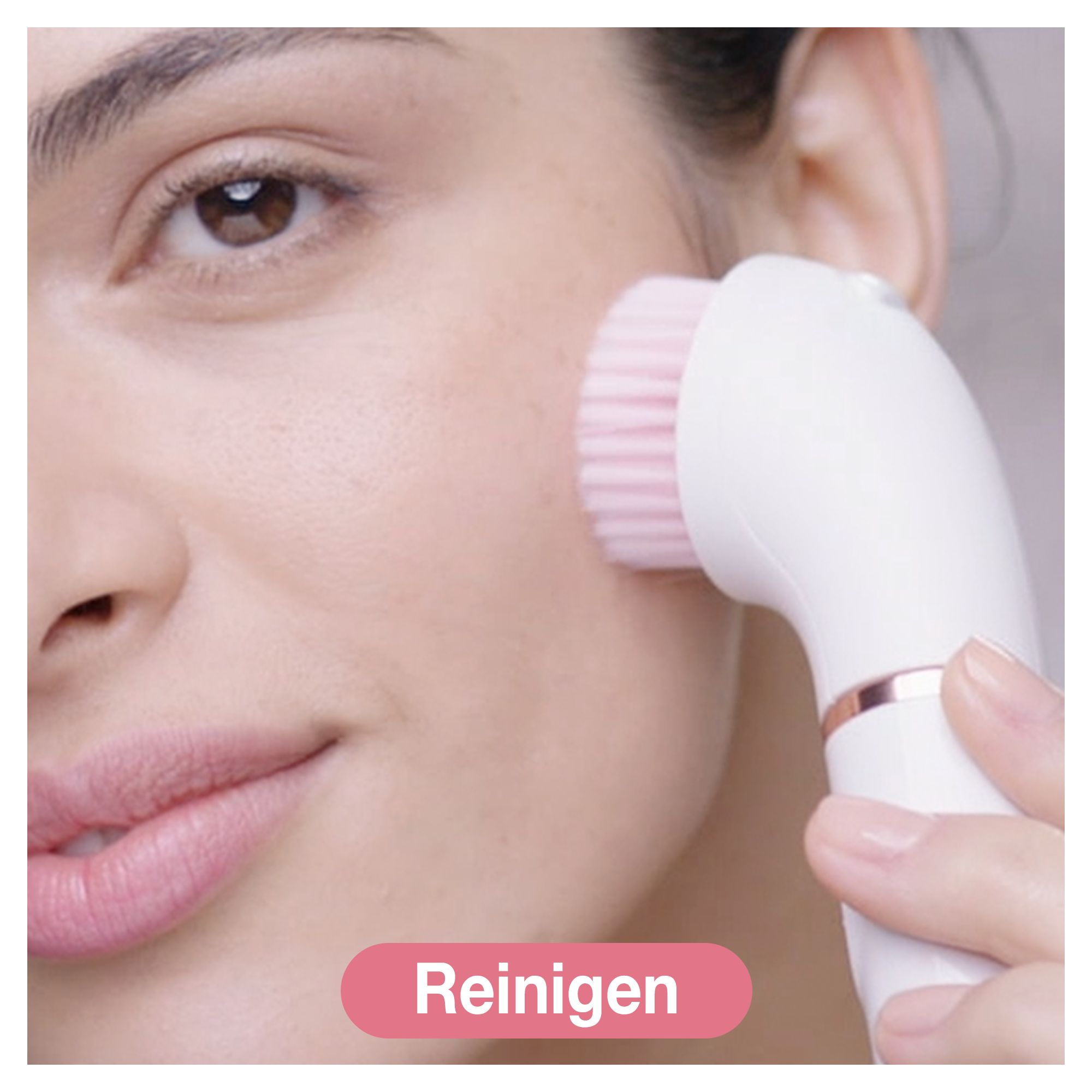 Eine Frau benutzt eine weiße Gesichtsbürste auf ihrer Wange. Rosa Text sagt 'Reinigen'.