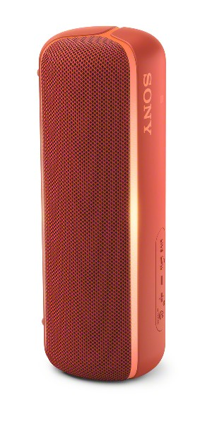 Ein rot-orangefarbener tragbarer Sony-Lautsprecher. Er hat eine Mesh-Front und eine glatte Rückseite. Das Sony-Logo ist sichtbar.