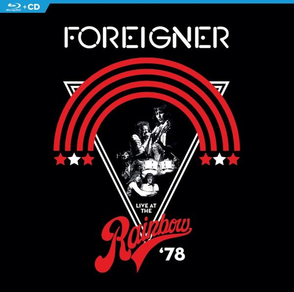 Albumhoes voor Foreigner. De band wordt getoond, met een regenboog en sterren op een zwarte achtergrond.