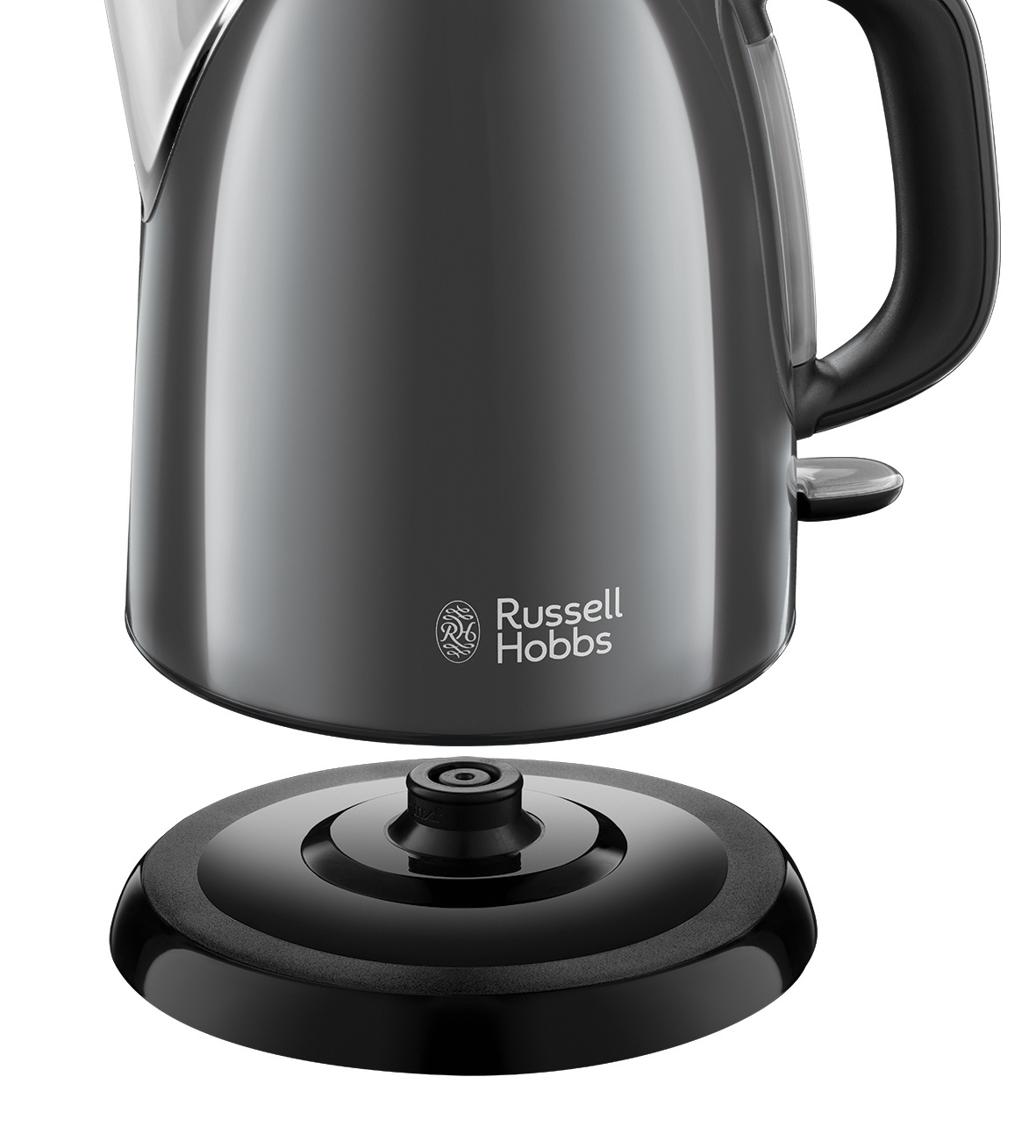 Un bollitore nero Russell Hobbs sulla sua base, dettaglio in primo piano, isolato su sfondo bianco.