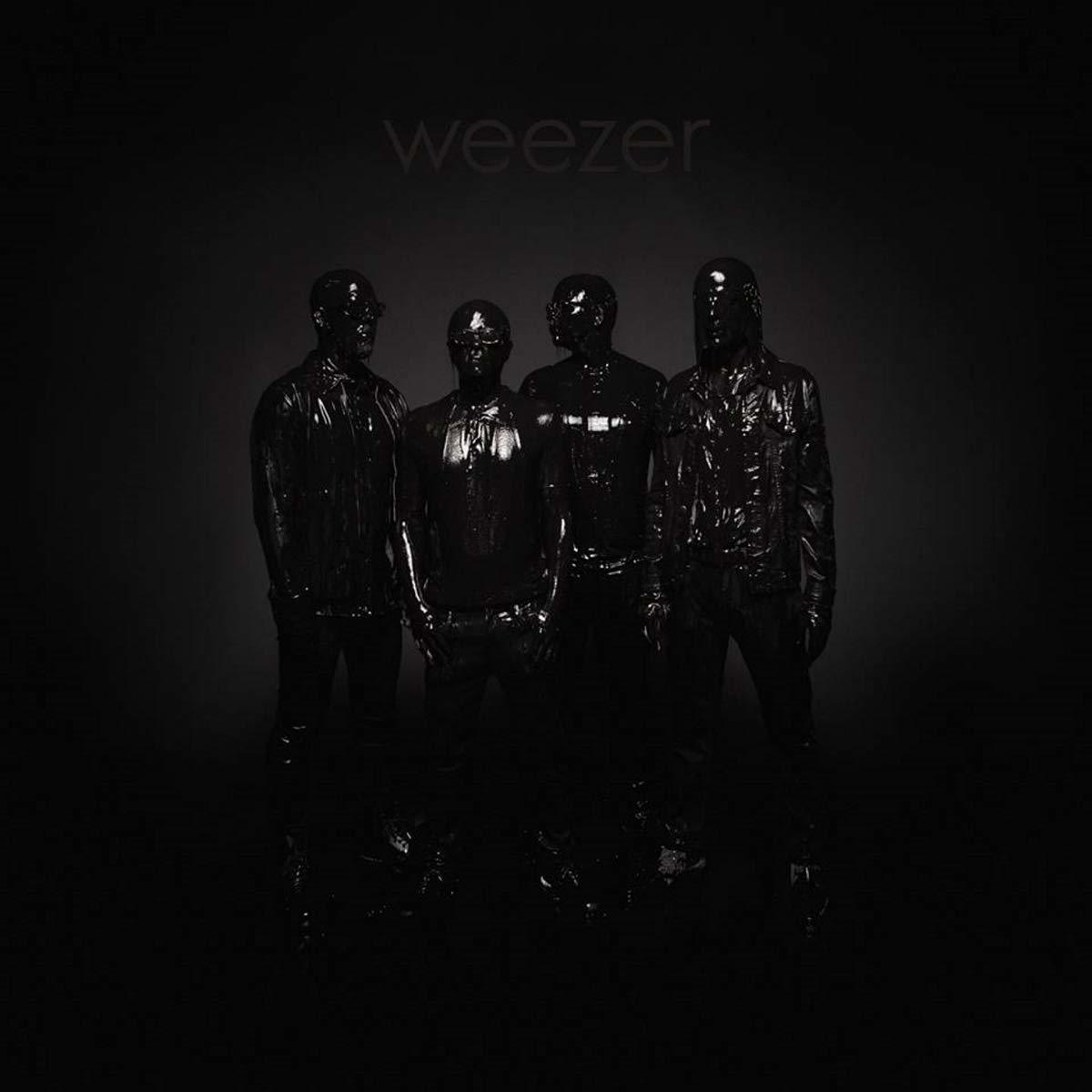 Albumhoes. Vier mannen in zwarte, glanzende pakken. Het woord "weezer" staat bovenaan.