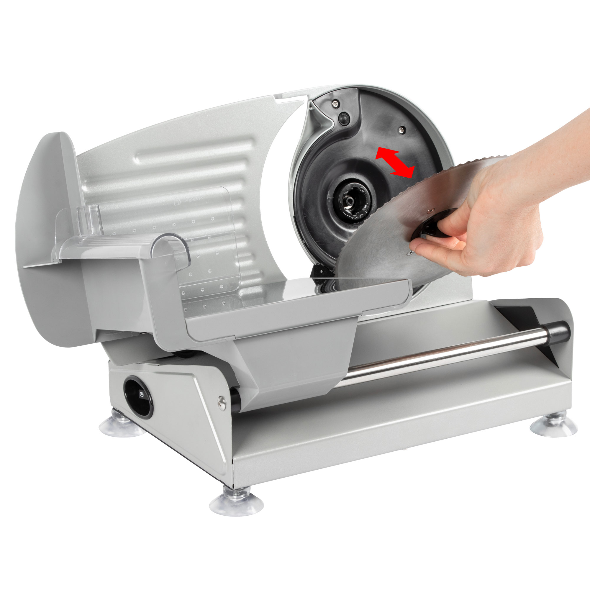 Fleischschneidemaschine, grau, mit einer Hand, die die Klinge ersetzt. Weißer Hintergrund.