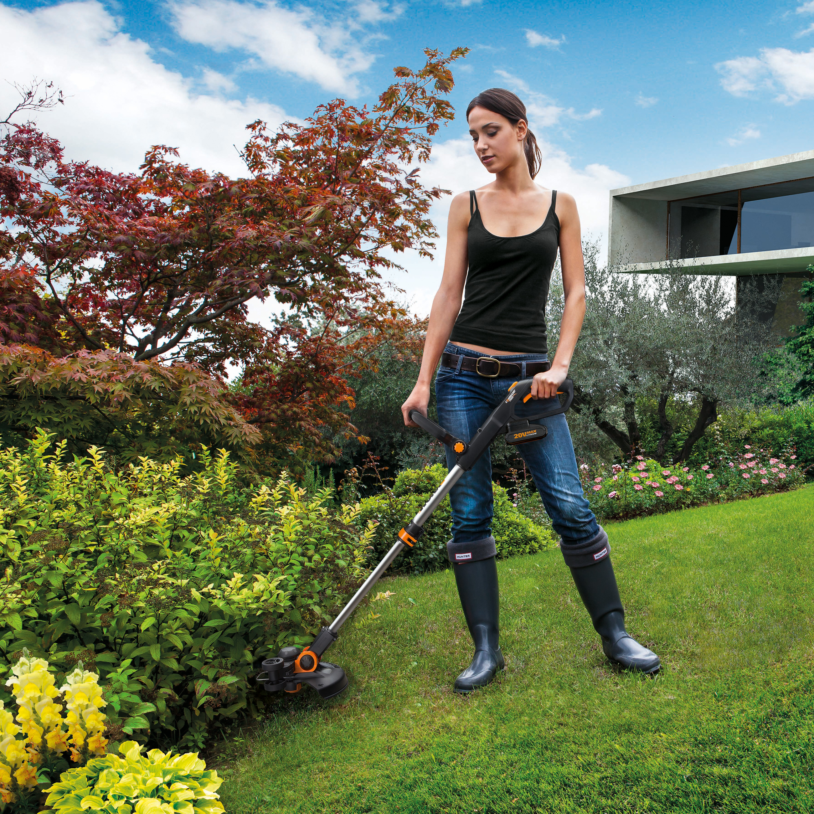 WORX WG163E.1 –​​ Inkl. Li-Ion Akku und Ladestation Akku-Rasentrimmer Orange/Schwarz