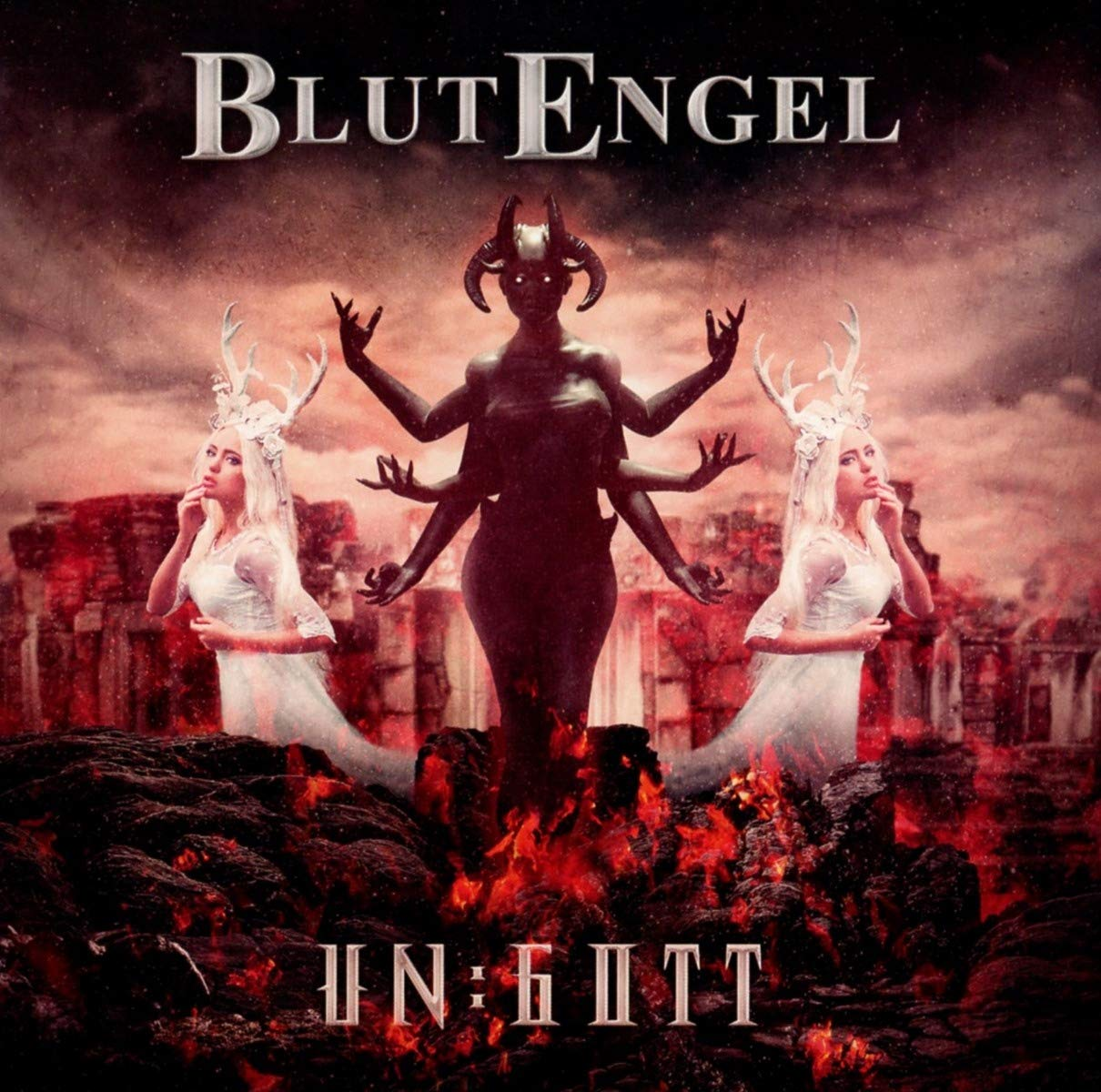 Blutengel album borító sötét figurával, két fehér ruhás nővel és tüzes háttérrel.