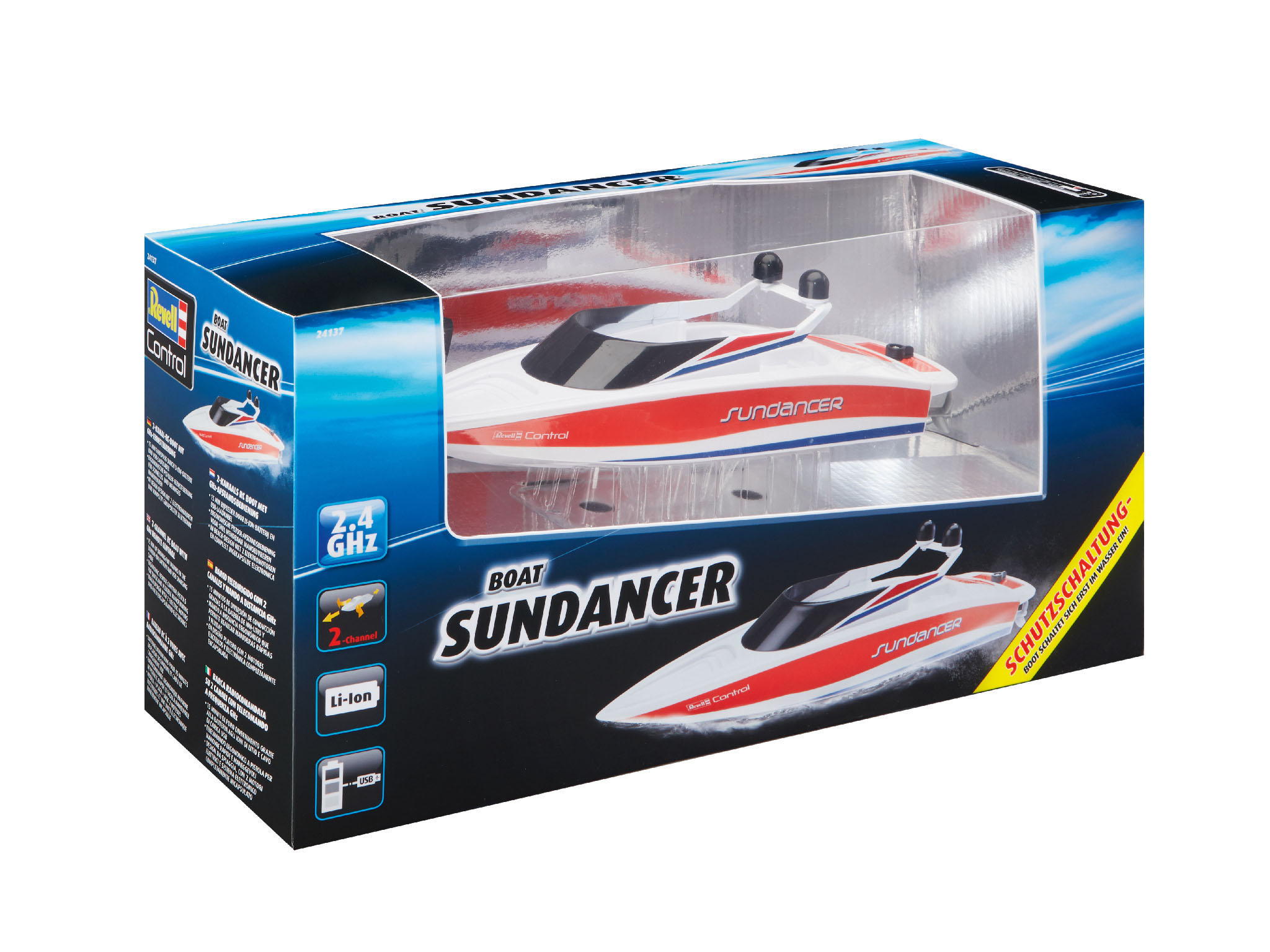 Box mit einem Spielzeugboot namens 'Sundancer'. Das Boot ist weiß, rot und hat ein Fenster.