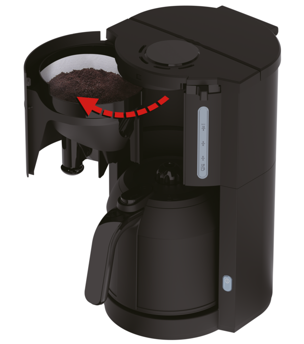 Een zwarte koffiemachine met koffiedik in het filter en een rode pijl.