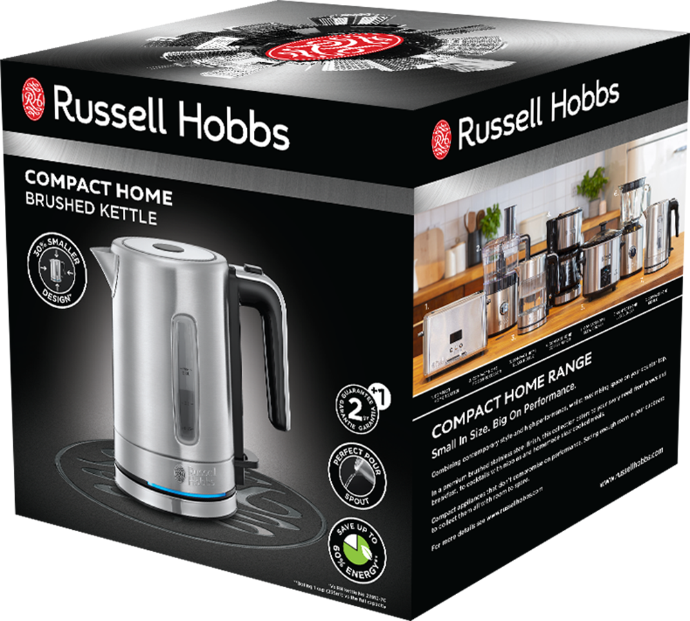 Russell Hobbs vízforraló egy dobozban. Ezüst színű és fekete fogantyúval rendelkezik. Szöveg a dobozon.