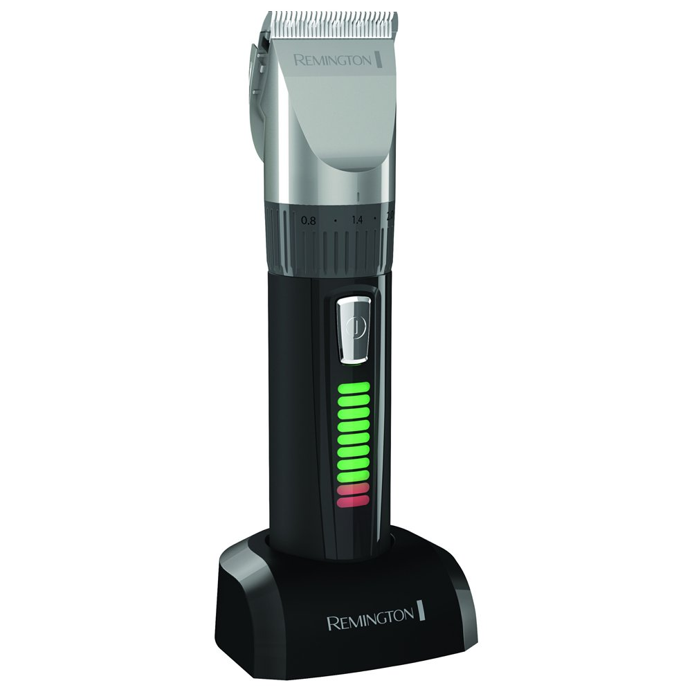 A black and silver hair clipper on a stand. The stand is also black. White background.