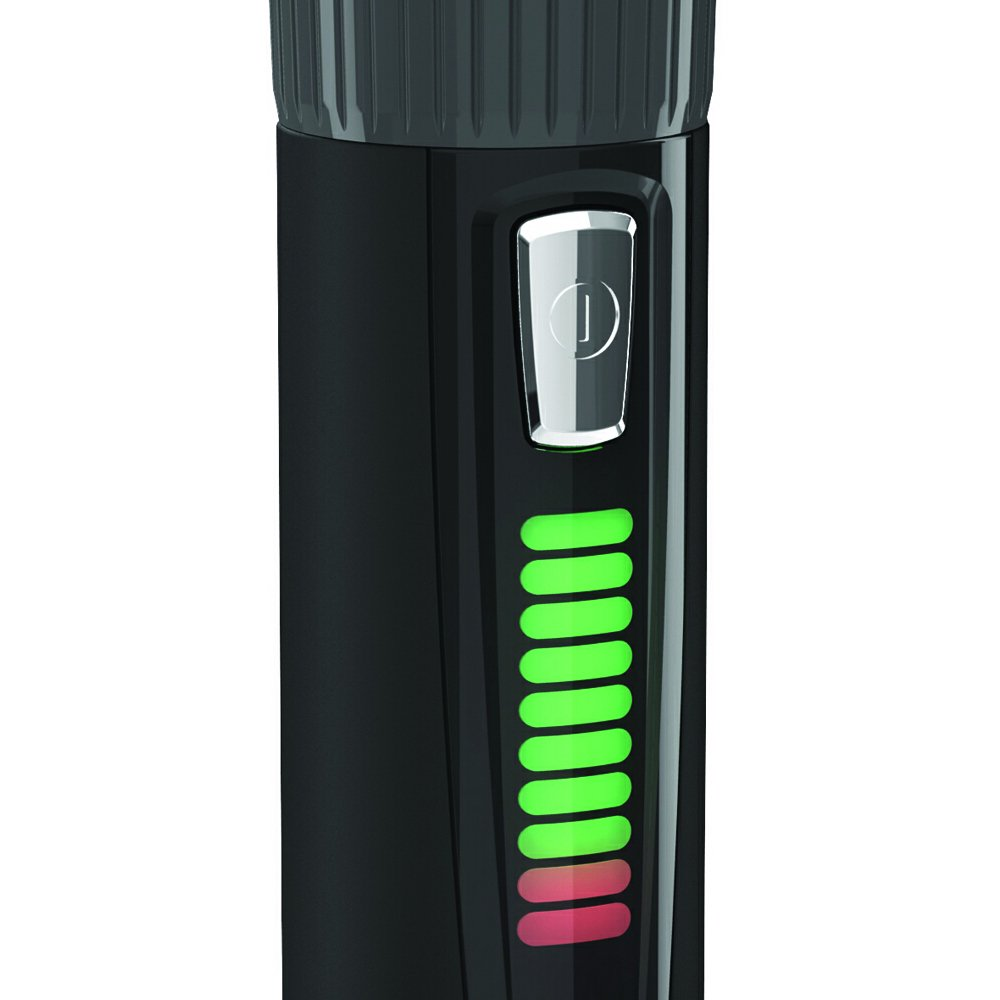 A black body hair trimmer with a green and red battery indicator.