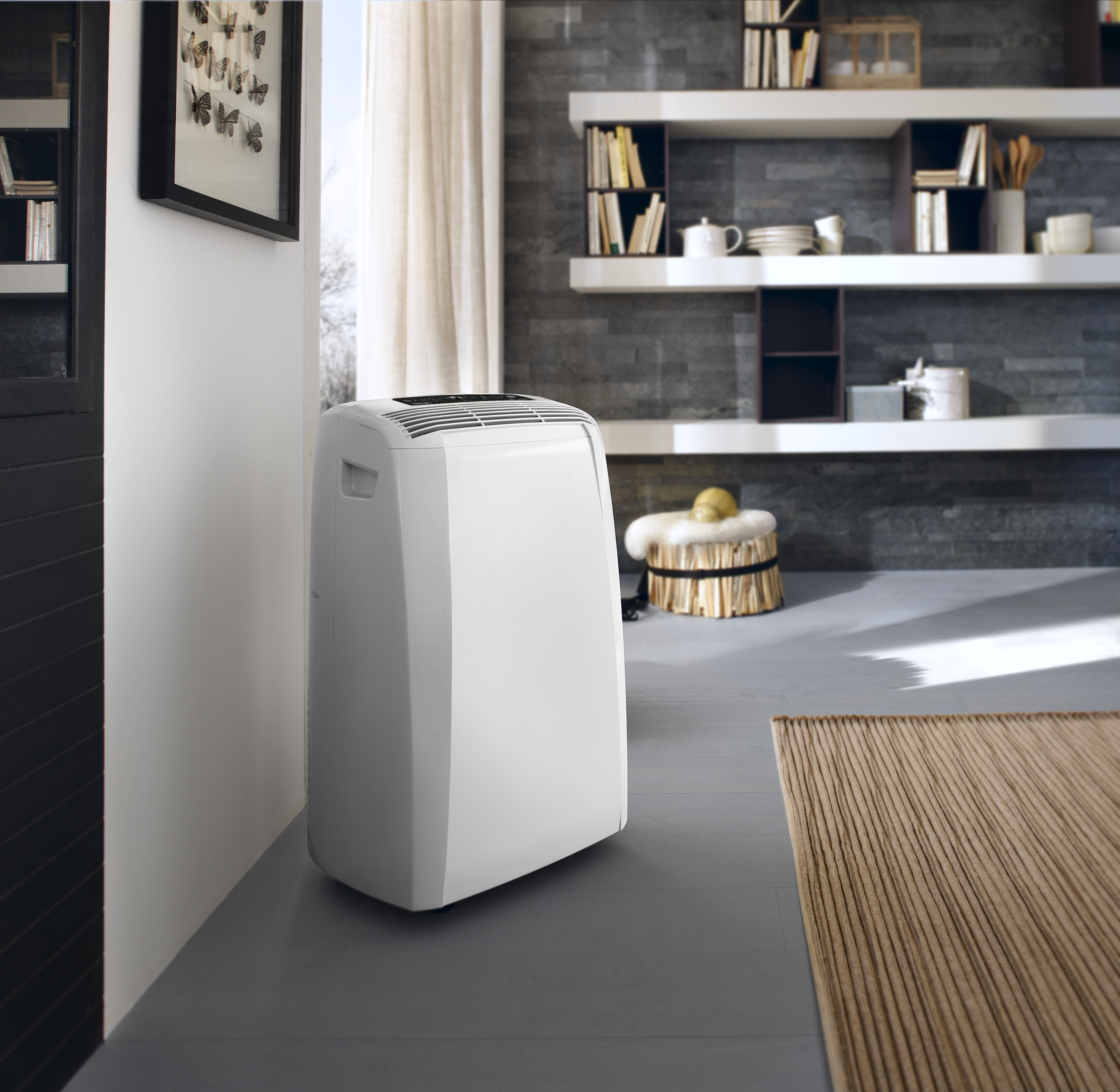 DE LONGHI PAC CN 93 ECO PINGUINO Mobiles Klimagerät (Max. Raumgröße: 90 m³, EEK: A, 10,500 BTU/h, Weiß)