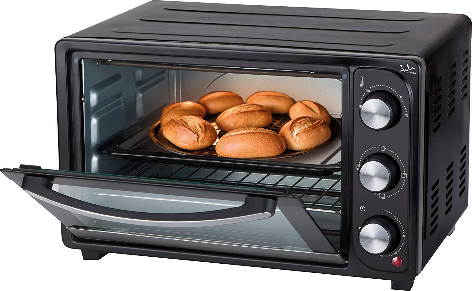 Mini horno negro con puerta abierta, horneando panecillos dentro.