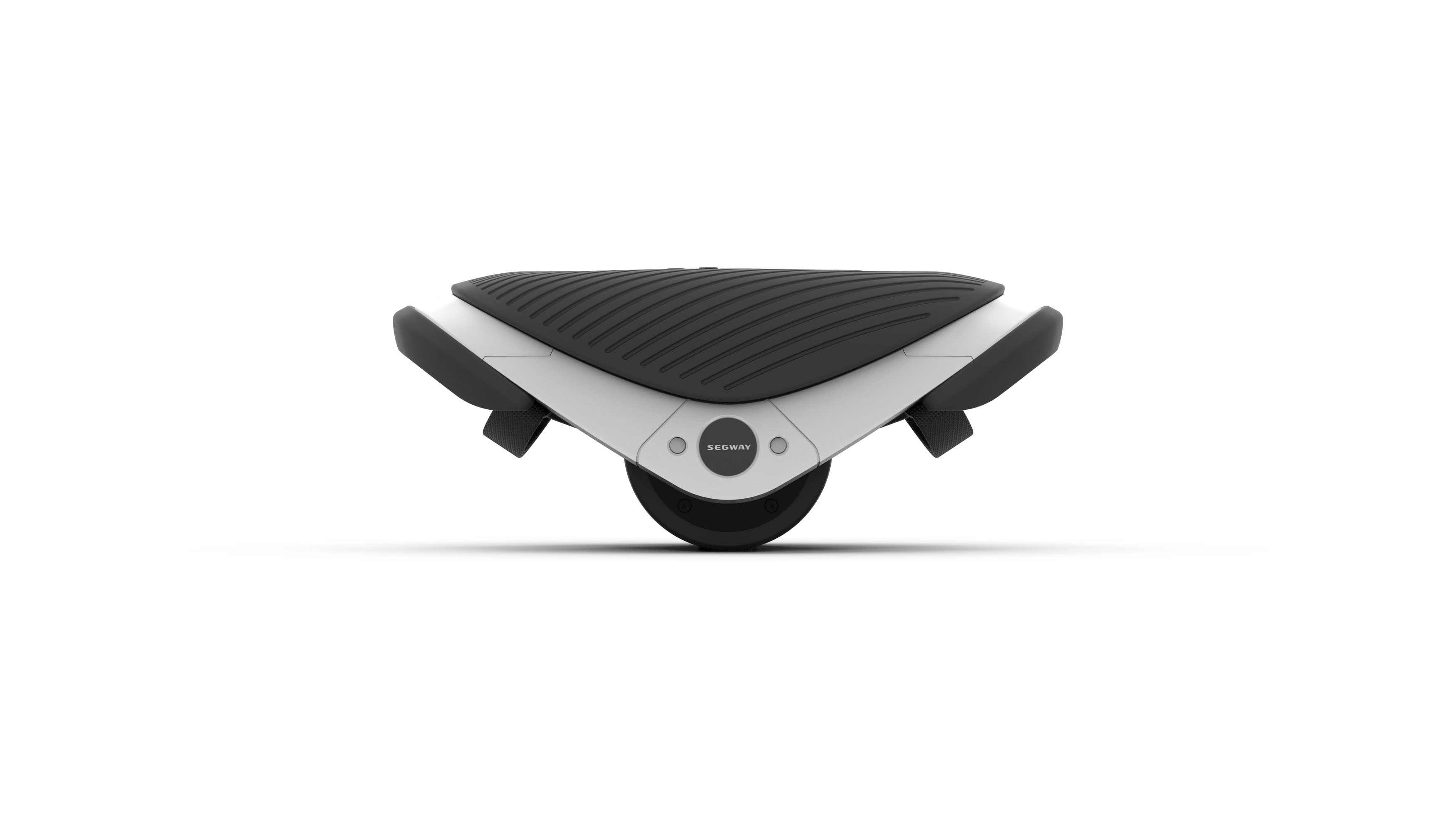 Ein weißes und schwarzes Segway, von oben betrachtet, mit einem zentralen Rad und einem strukturierten Fußbereich.