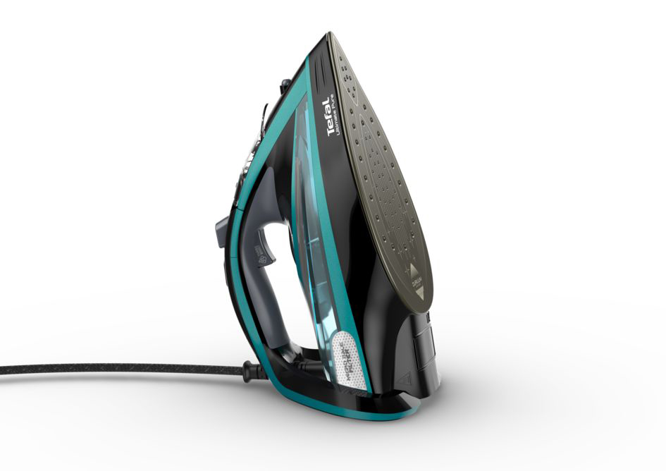 Black and teal iron on a white surface. The brand Tefal is visible.