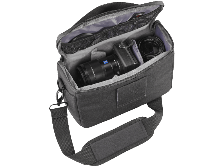 Black camera bag open, revealing a camera, lens, and other items.